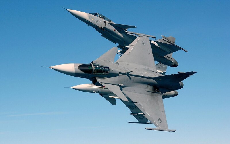 Two fighter jets in formation
