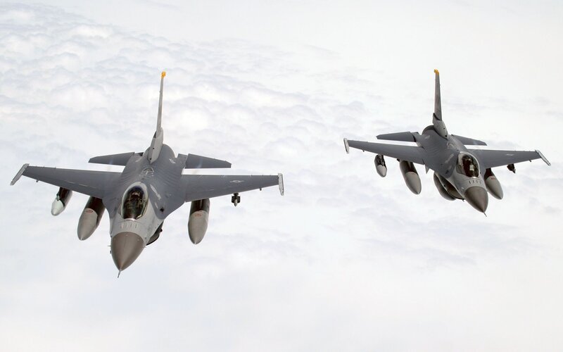 Two fighter jets in formation