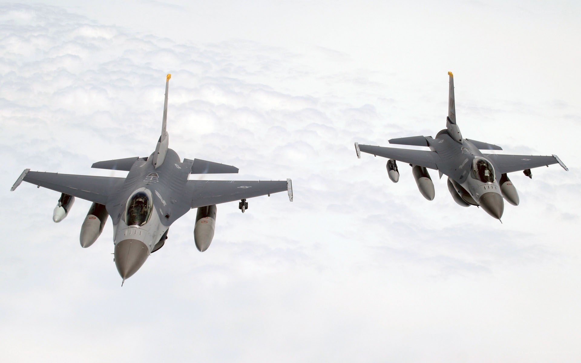 Two fighter jets in formation