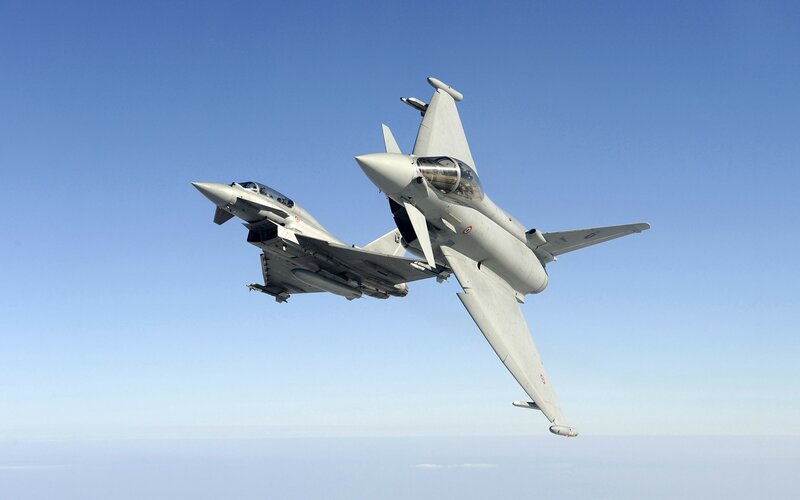 Two fighter jets in formation