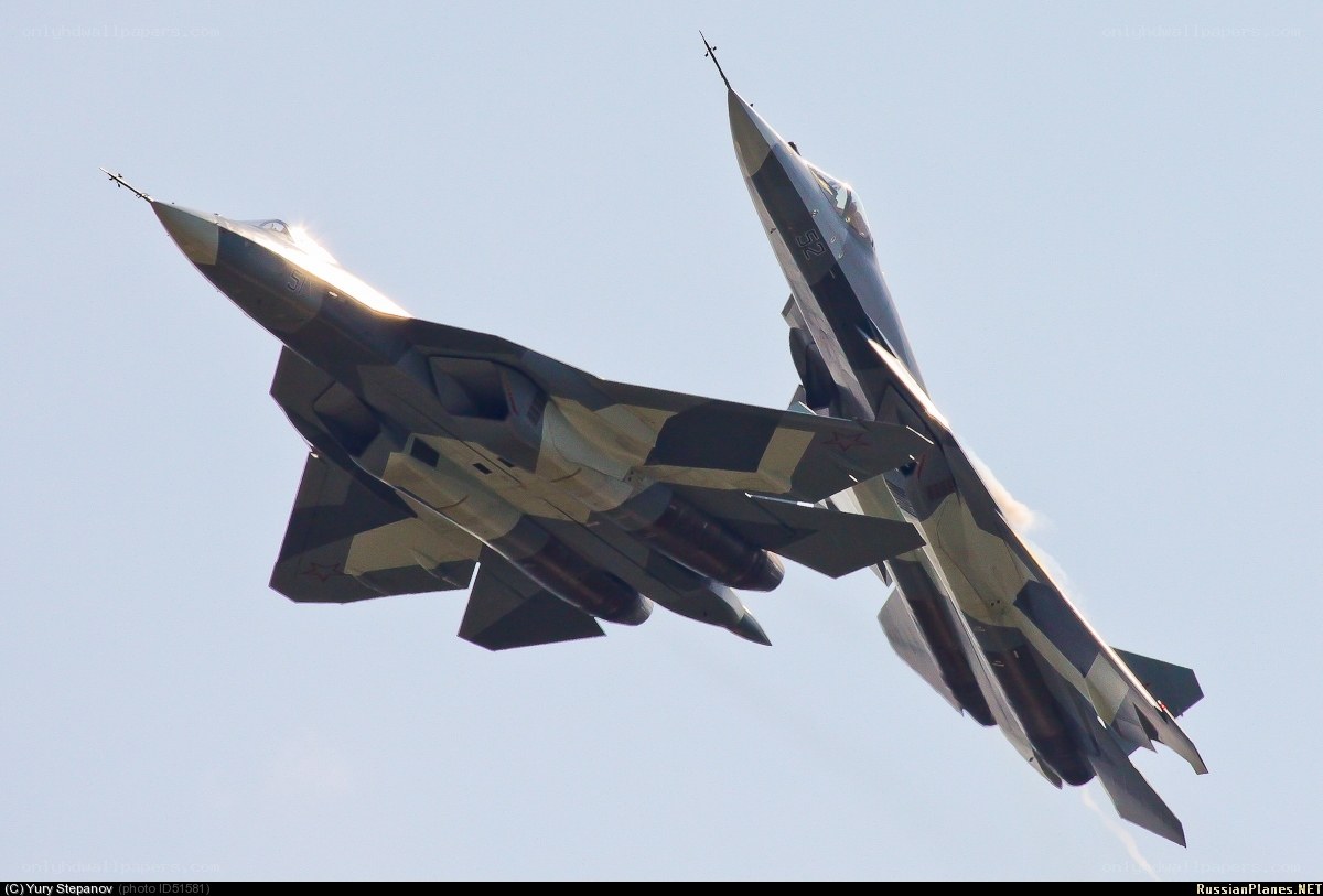 Two fighter jets in formation