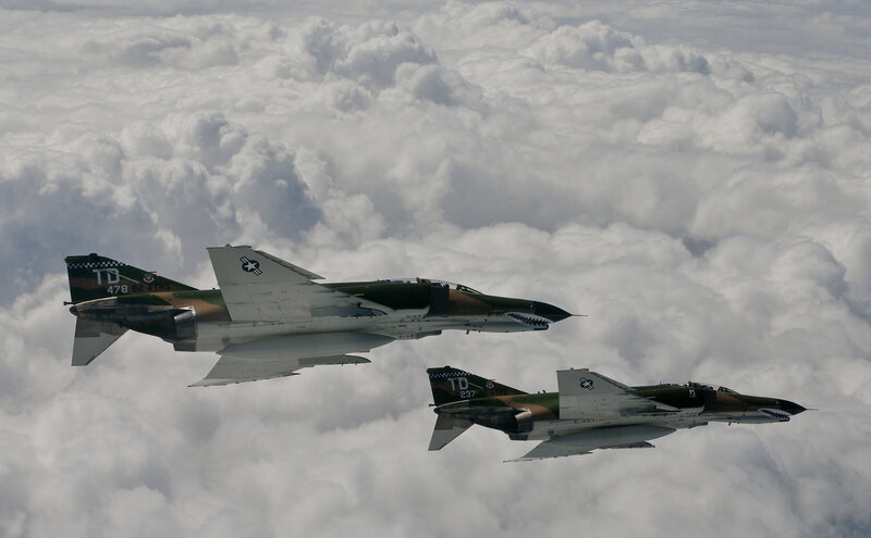 Two fighter jets in formation