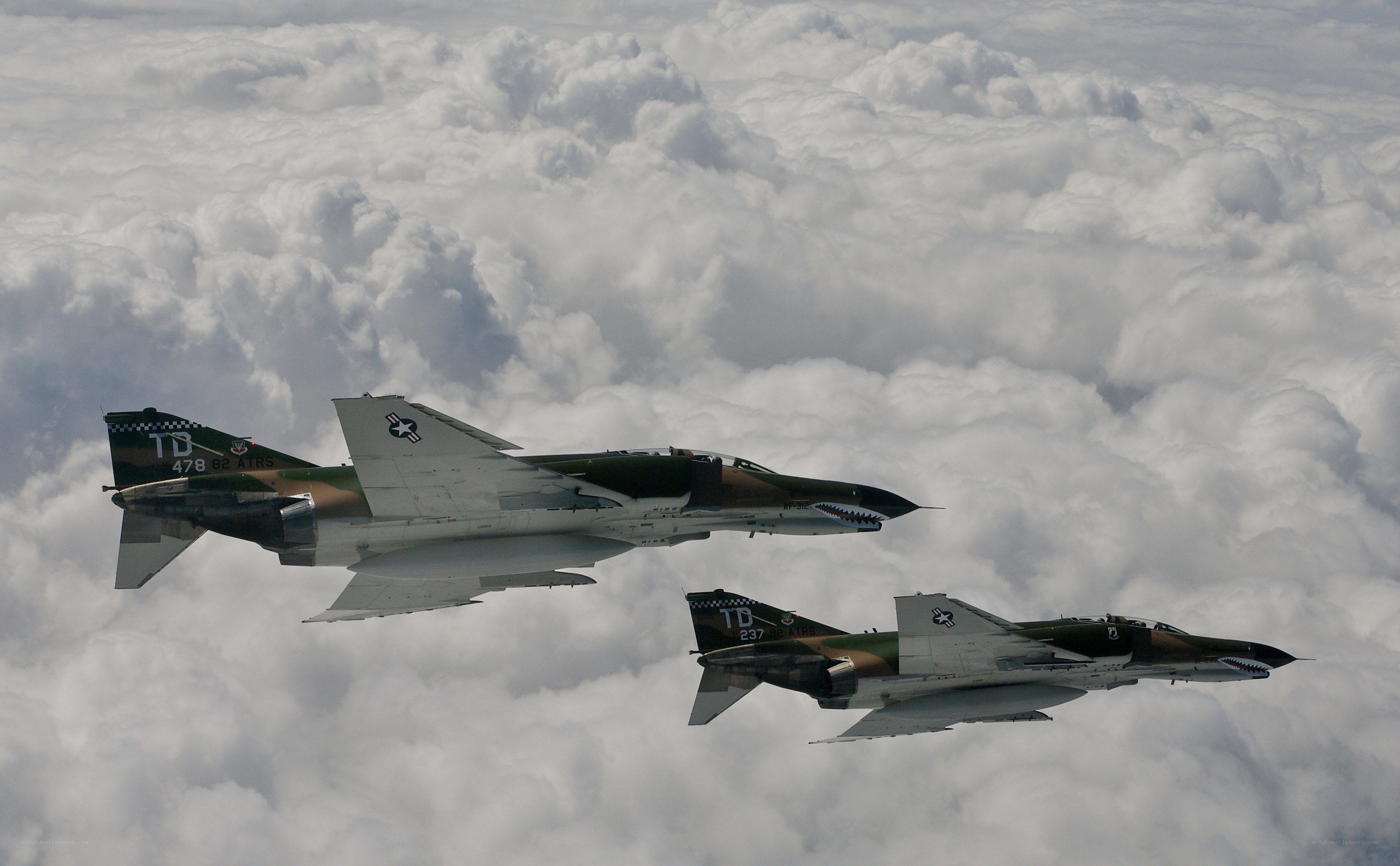 Two fighter jets in formation
