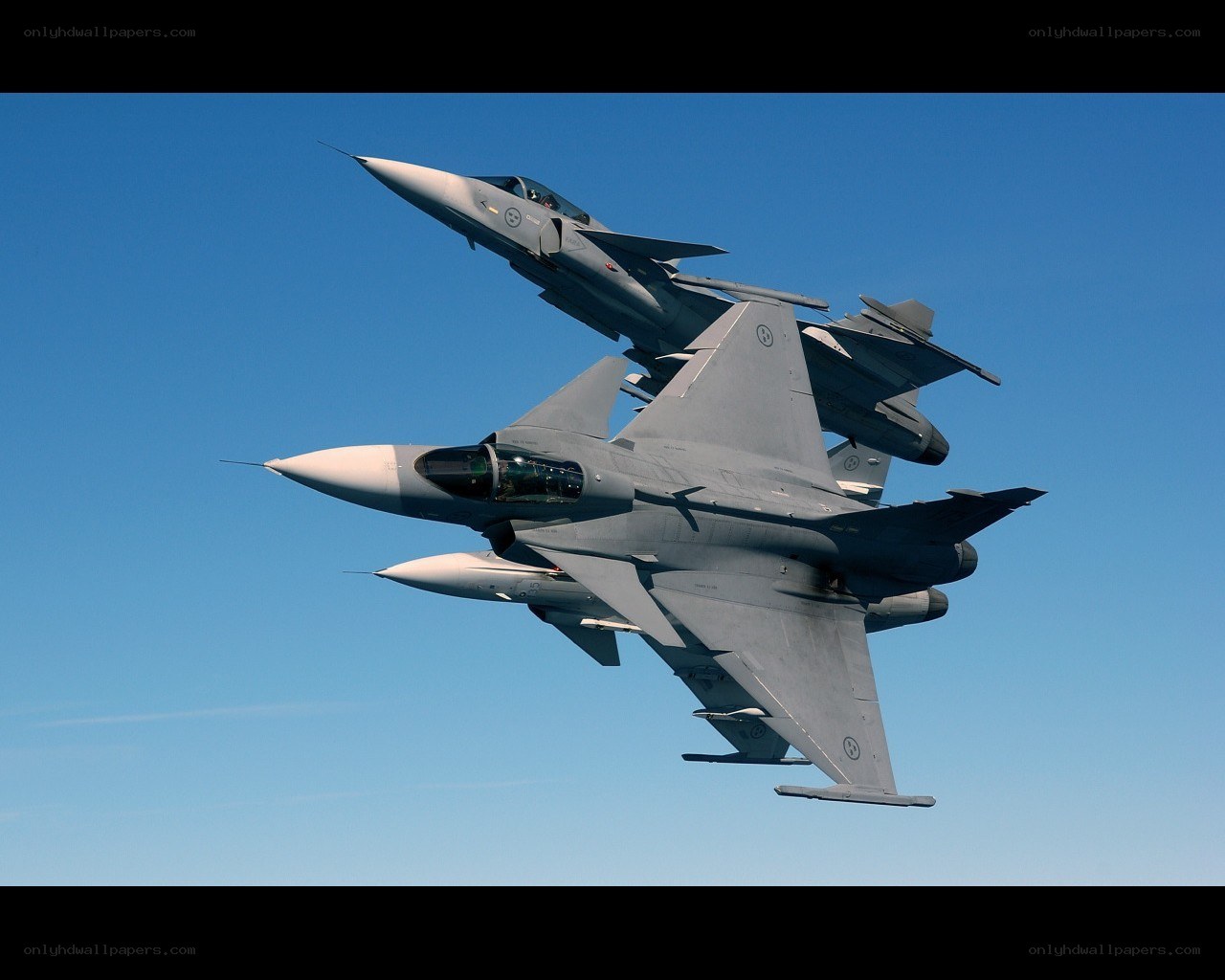 Two fighter jets in formation