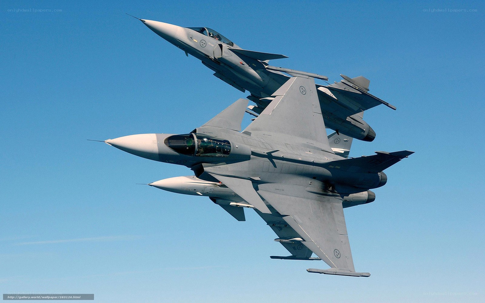 Two fighter jets in formation