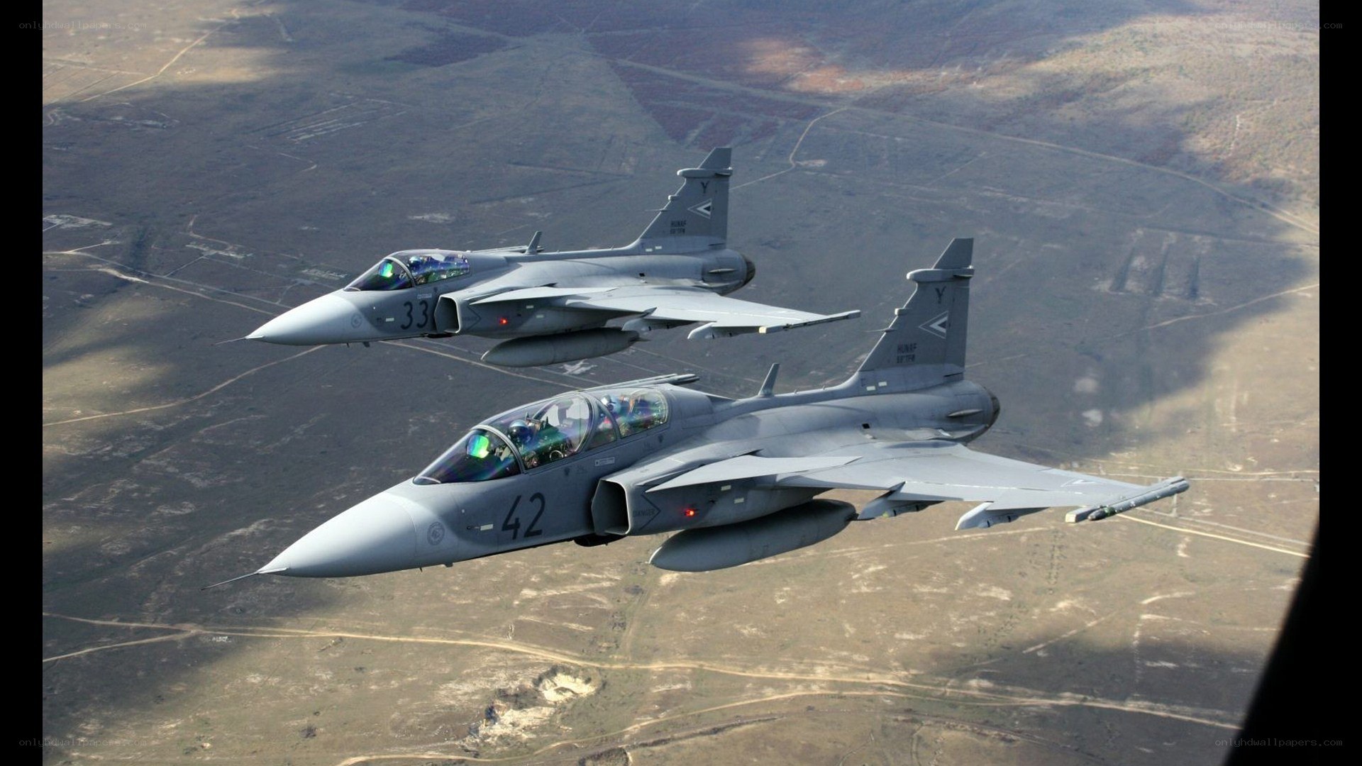 Two fighter jets in formation