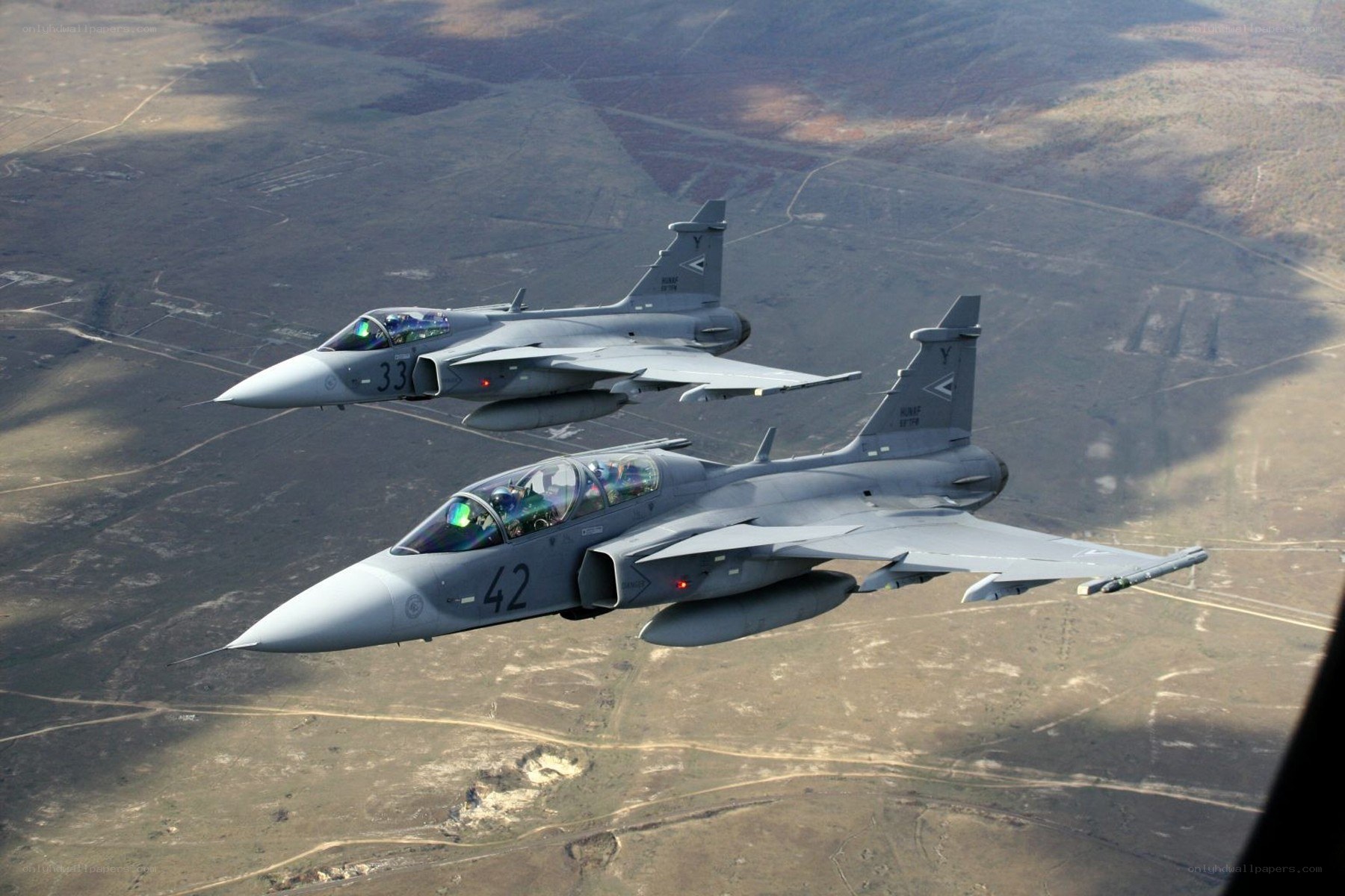 Two fighter jets in formation