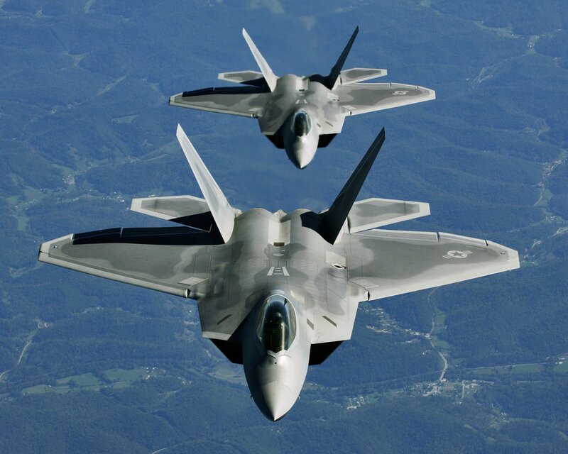 Two fighter jets in formation
