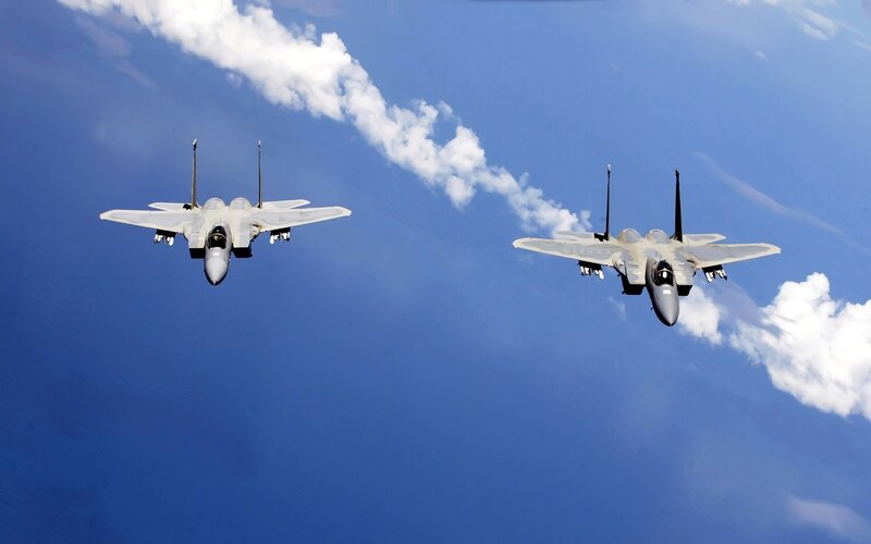 Two fighter jets in formation