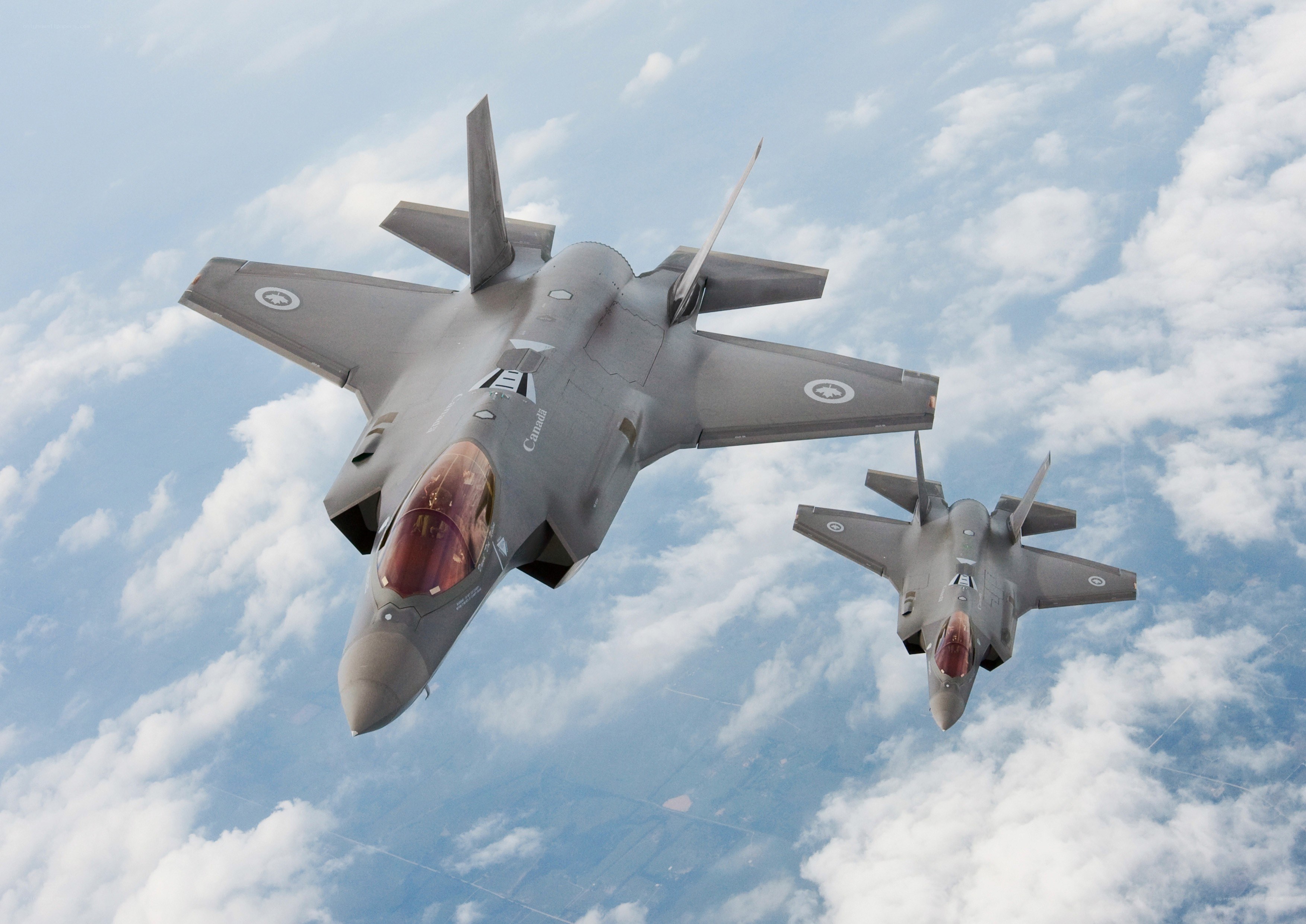 Two fighter jets in formation