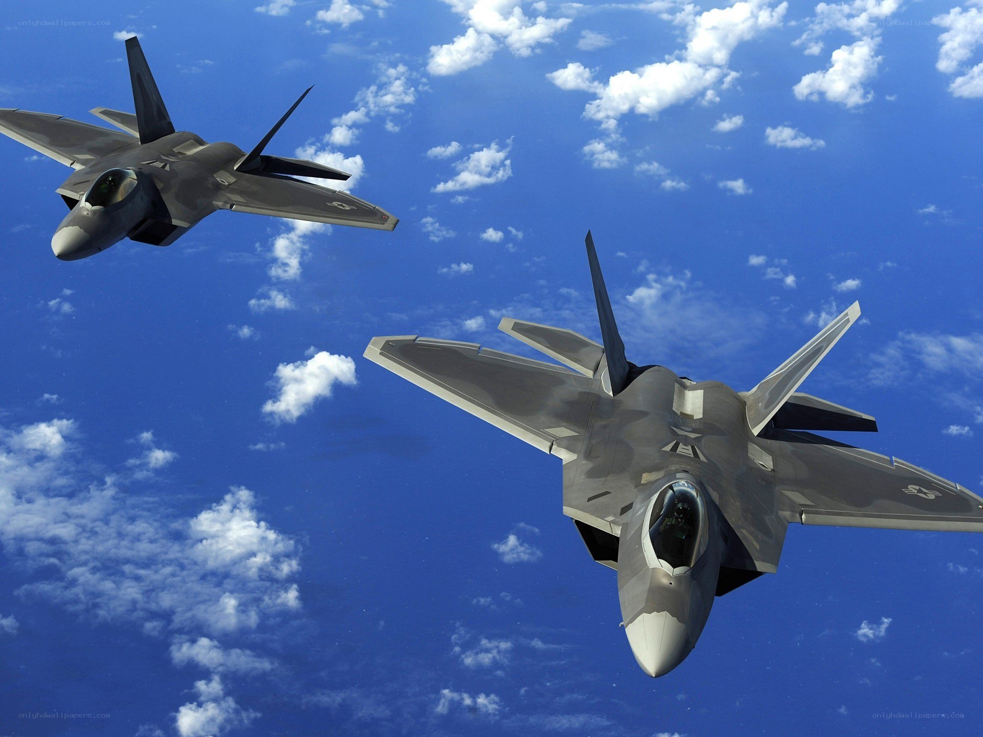 Two fighter jets in formation