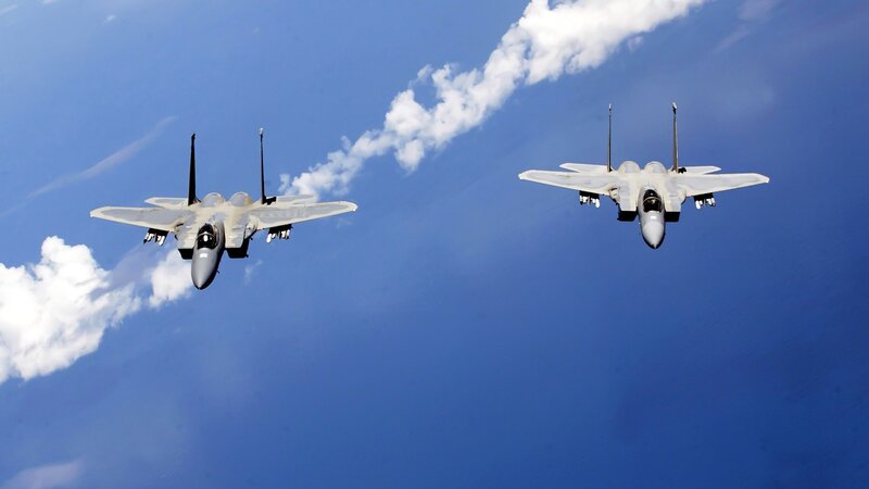 Two fighter jets in formation