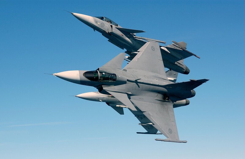 Two Fighter Jets in Formation — Blue, Dynamic, Afternoon, Photograph, Aircraft, Sky, Cockpit