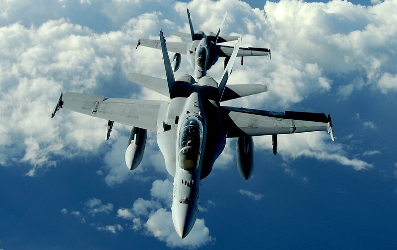 Two Fighter Jets in Formation — Blue