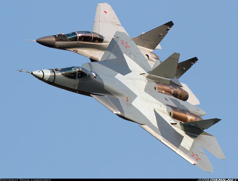 Two Fighter Jets in Formation — Gray, Dynamic, Afternoon