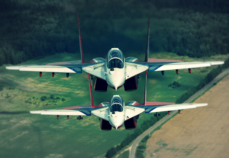 Two Fighter Jets in Formation — Green