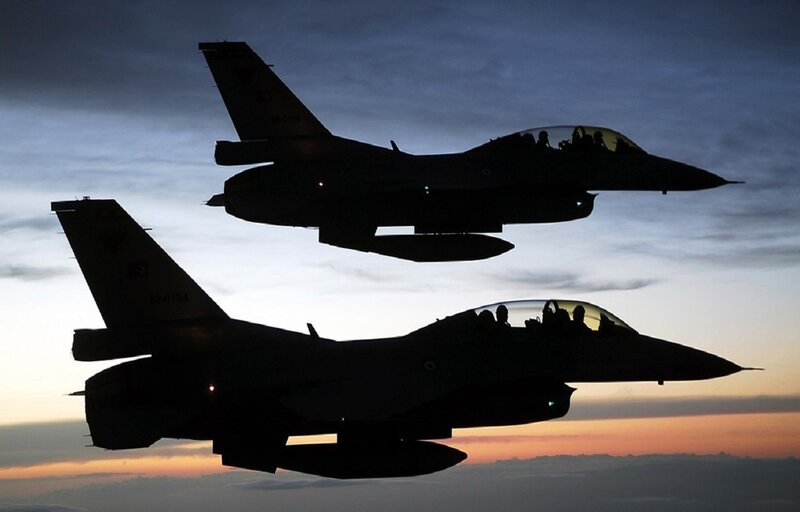 Two Fighter Jets in Formation — Orange