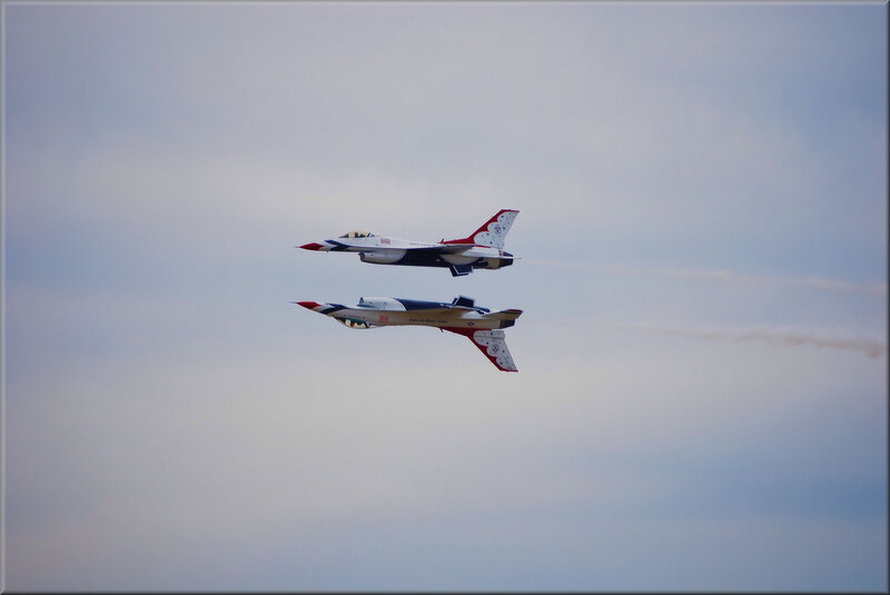 Two Fighter Jets in Formation — White
