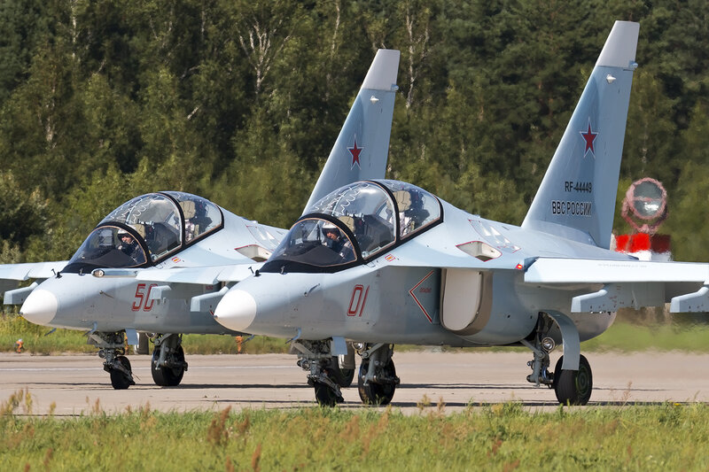 Two Fighter Jets on Runway — Gray, Neutral, Afternoon