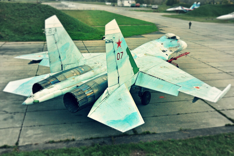 Two Fighter Jets on Tarmac — Green