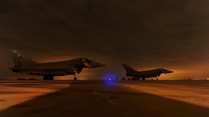Two Fighter Jets on Tarmac — Orange