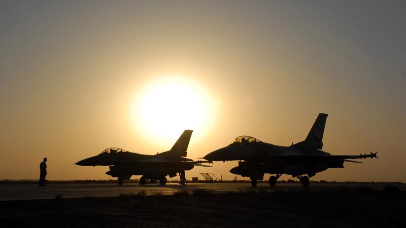 Two Fighter Jets on Tarmac — Yellow, Dramatic