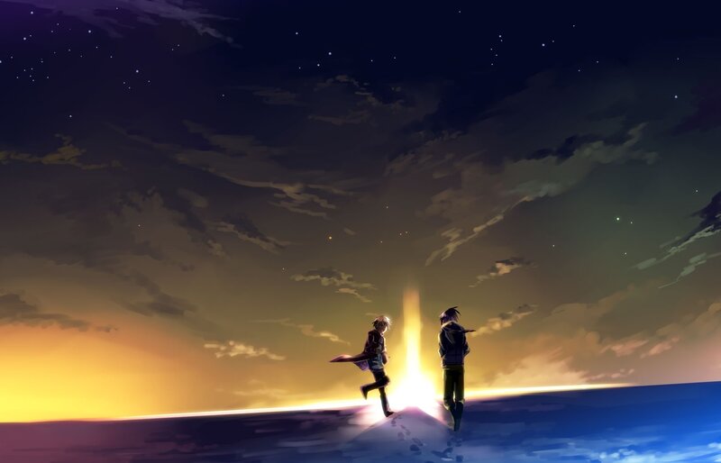 two figures at sunset