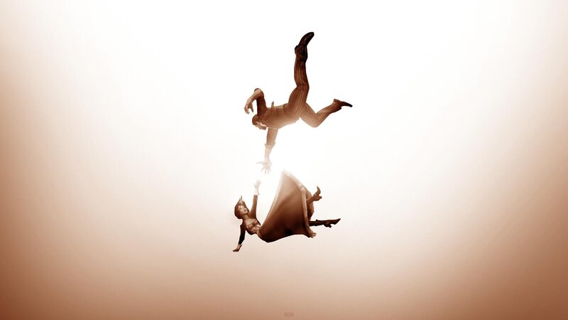 Two figures falling in sepia
