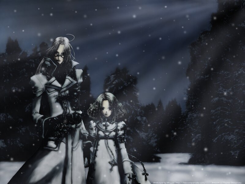 Two figures in a snowy forest