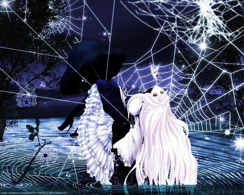 Two figures in a web-covered night