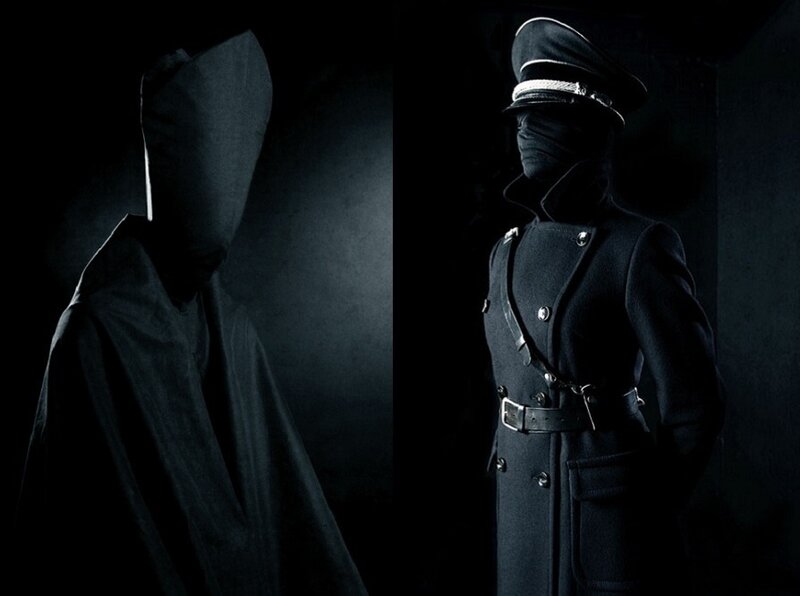 Two Figures in Dark Clothing