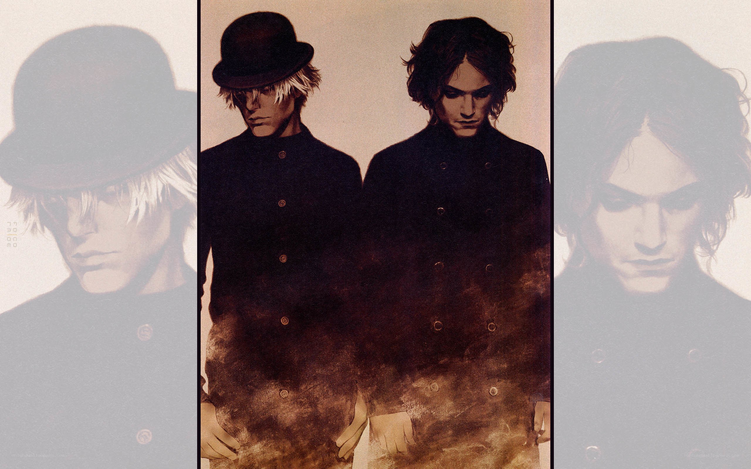 two figures in dark coats