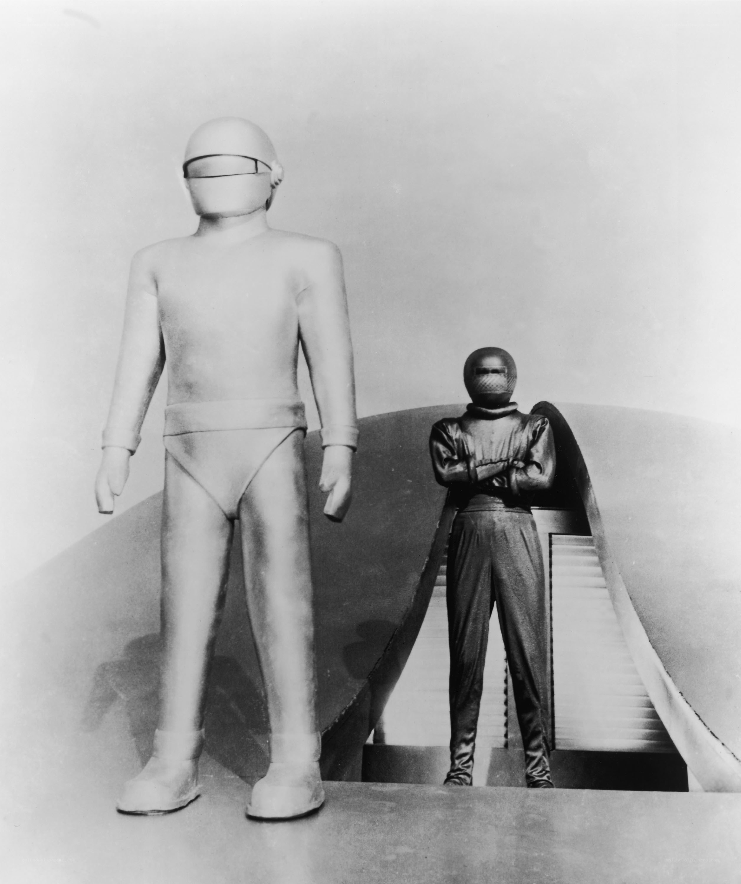Two figures in futuristic suits