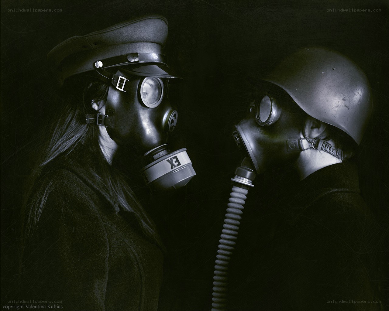 Two figures in gas masks