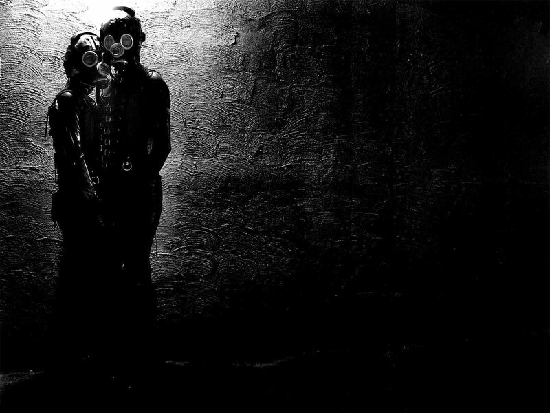 Two Figures in Gas Masks — Black, Dramatic, Photograph