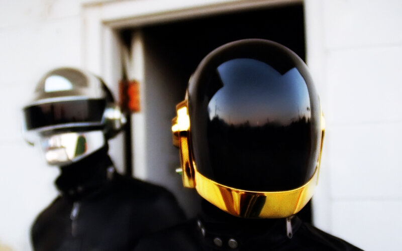 Two Figures in Helmets — Black, Dramatic, Sunset, Photograph