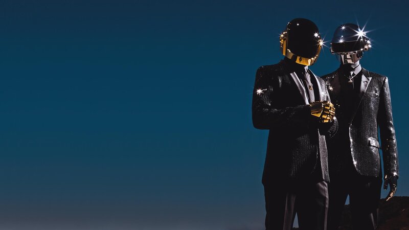 Two Figures in Helmets — Blue, Dramatic, Night, Photograph