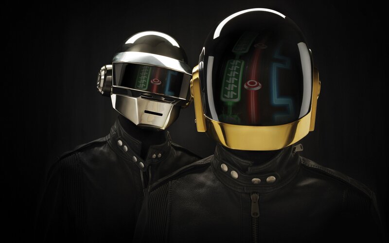 Two Figures in Helmets — Dramatic, Dark Background