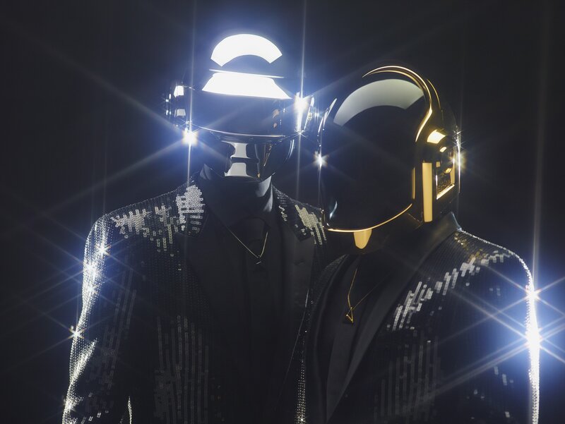 Two Figures in Helmets — Dramatic, Gold