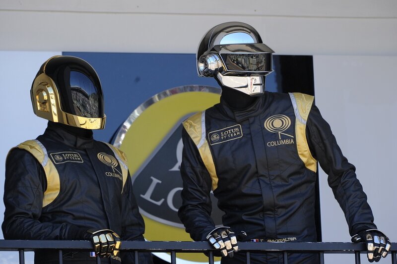Two Figures in Racing Suits — Black