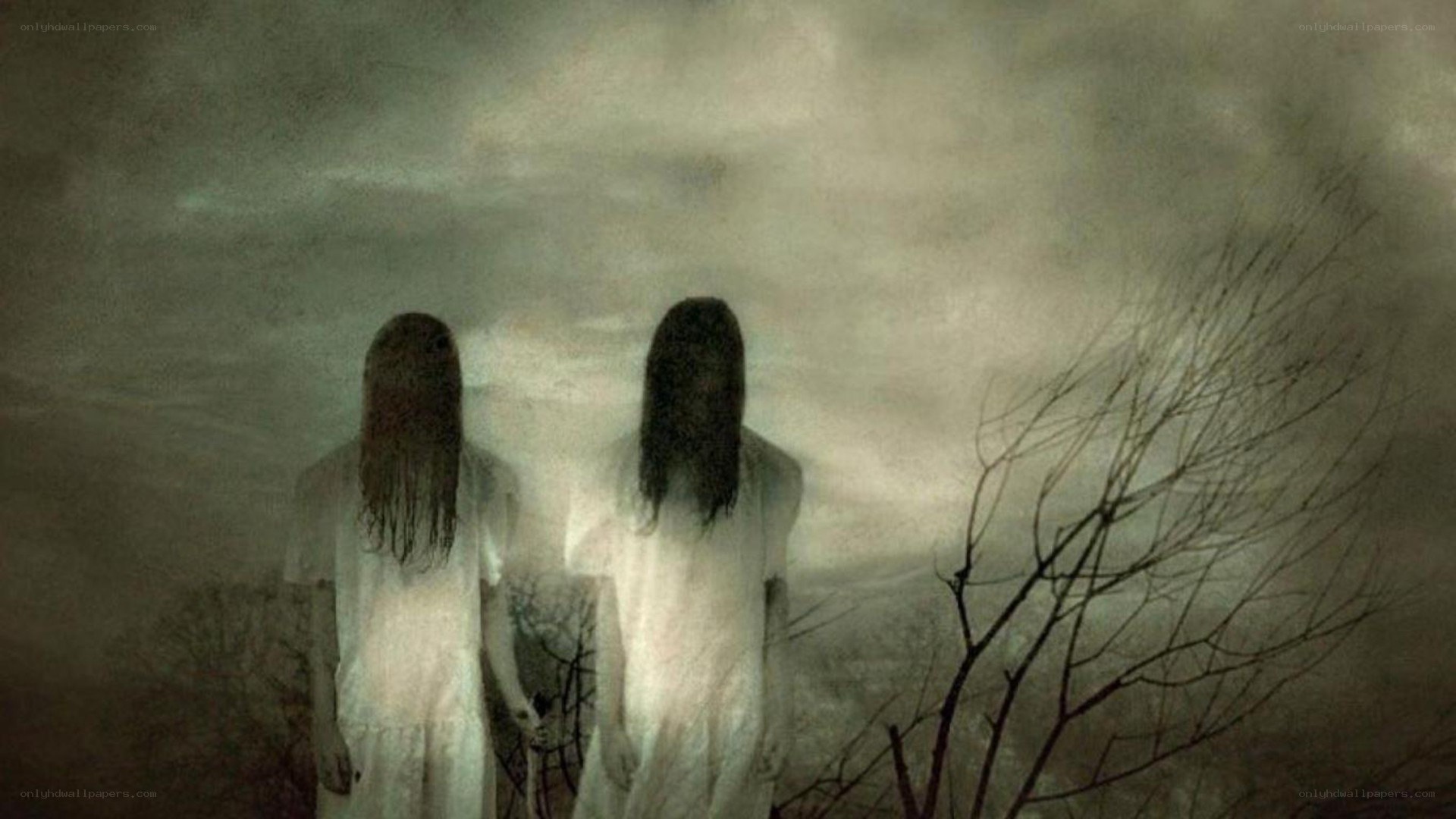two figures in white dresses