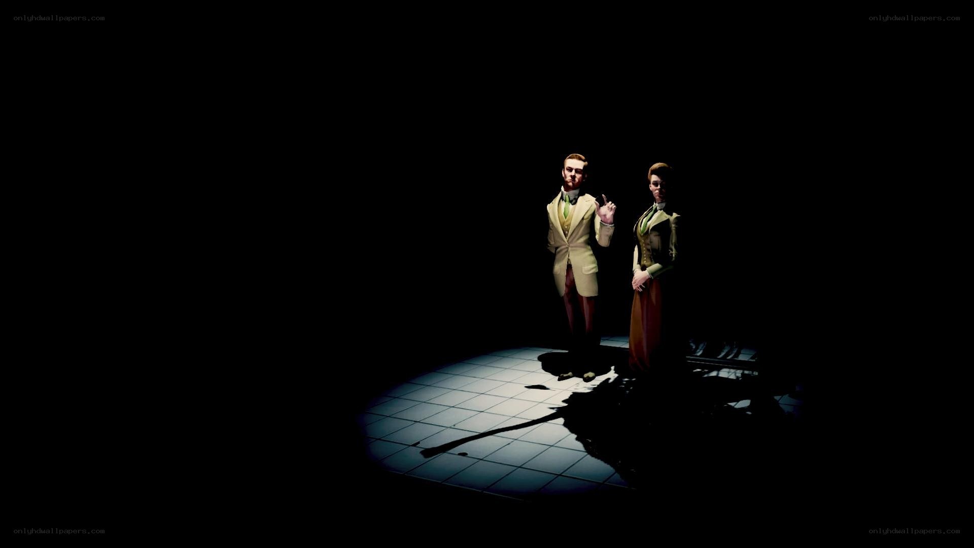 two figures on a lit stage