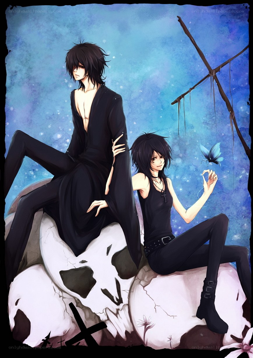 Two figures on a skull