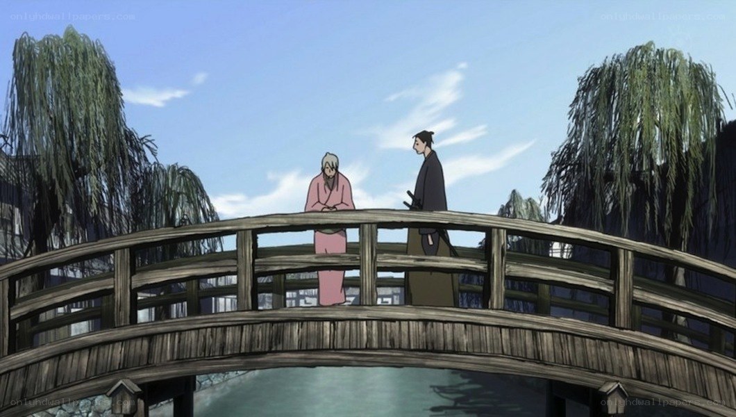 Two figures on a wooden bridge