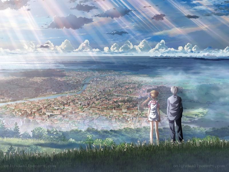 Two figures overlook a coastal city