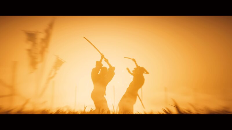 Two Figures Silhouetted — Orange