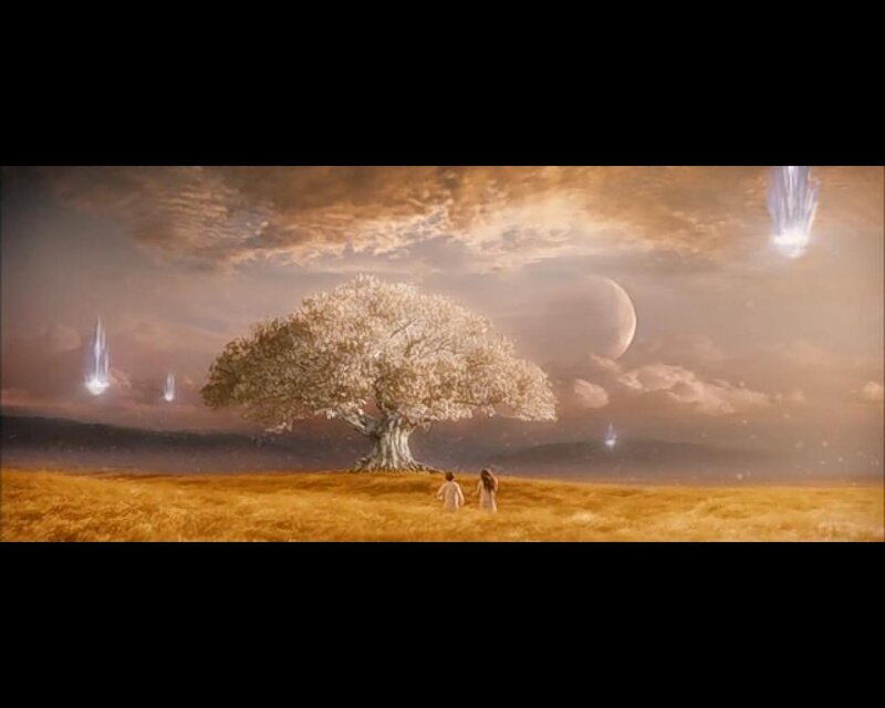 Two figures walk to a tree