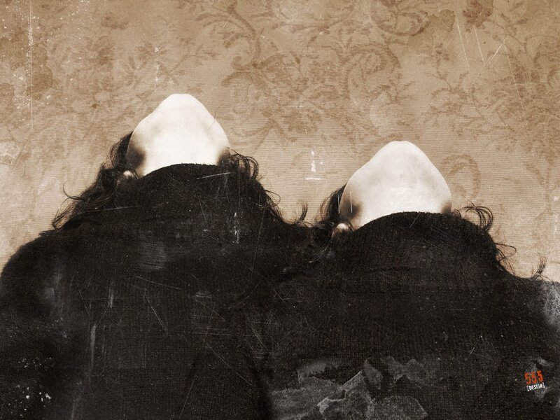 two figures with white heads