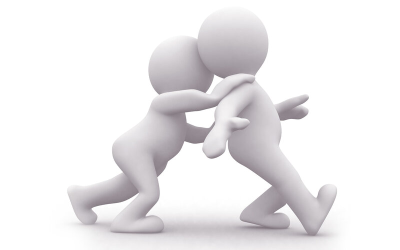 Two figures wrestling