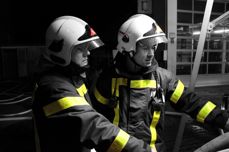 Two Firefighters at Night